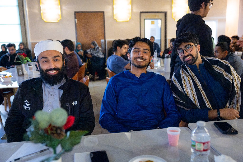 Three attendees smiling together at a Nuun gathering